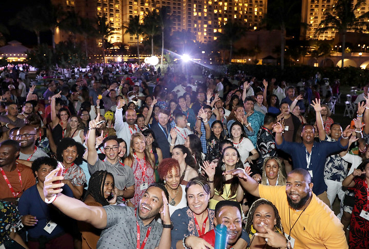 Large group of happy people gathering