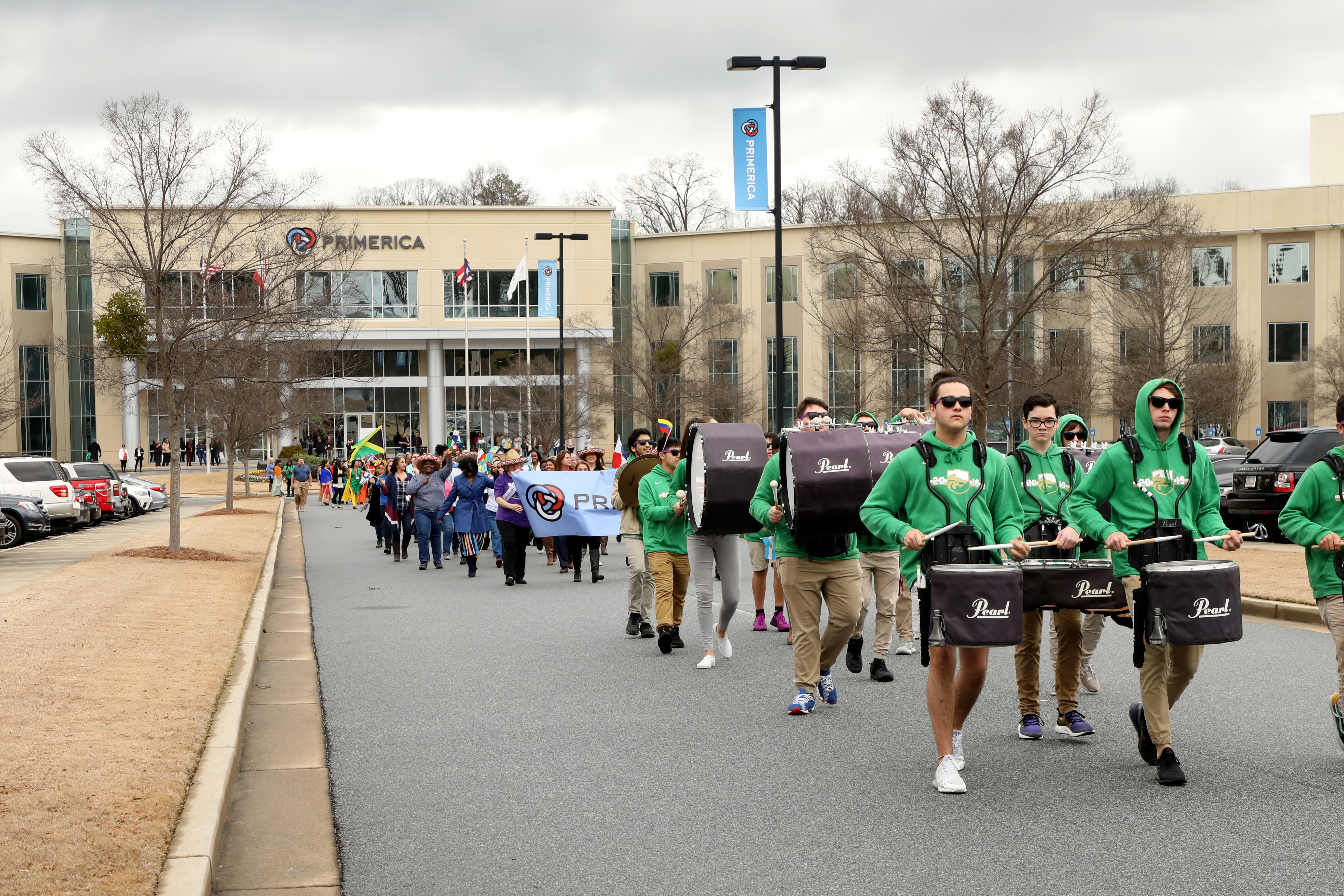 Photo of a parade in front of Primerica home office