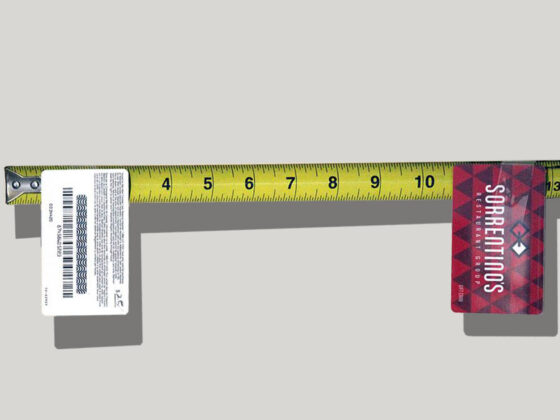 Photo of tape measurer with gift cards attached